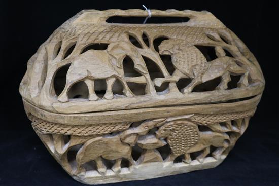 A Botswana wooden box, with carved animal design